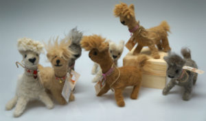 This needle felted herd looks like a miniature version of our herd on the farm!